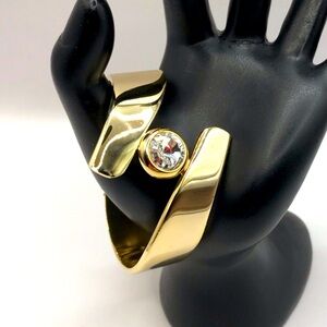 Elegant Gold-Tone Hinged Bracelet with Crystal Accent